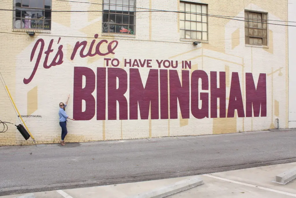 Melanie standing in front of Birmingham mural before Instagram Lightroom preset applied