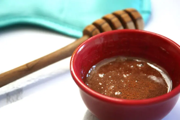 honey and cinnamon mixture with honey dripper in background | hearth health happiness