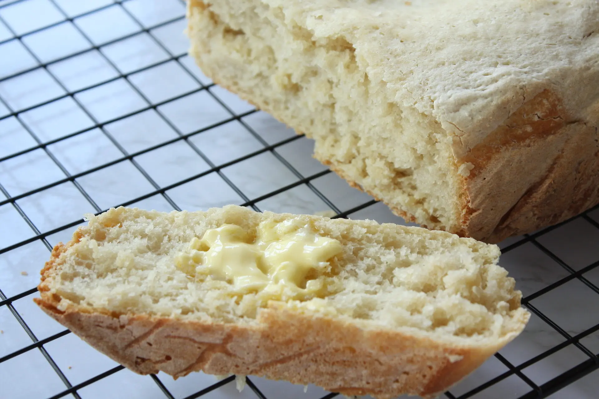 Slow cooker bread with slice and butter