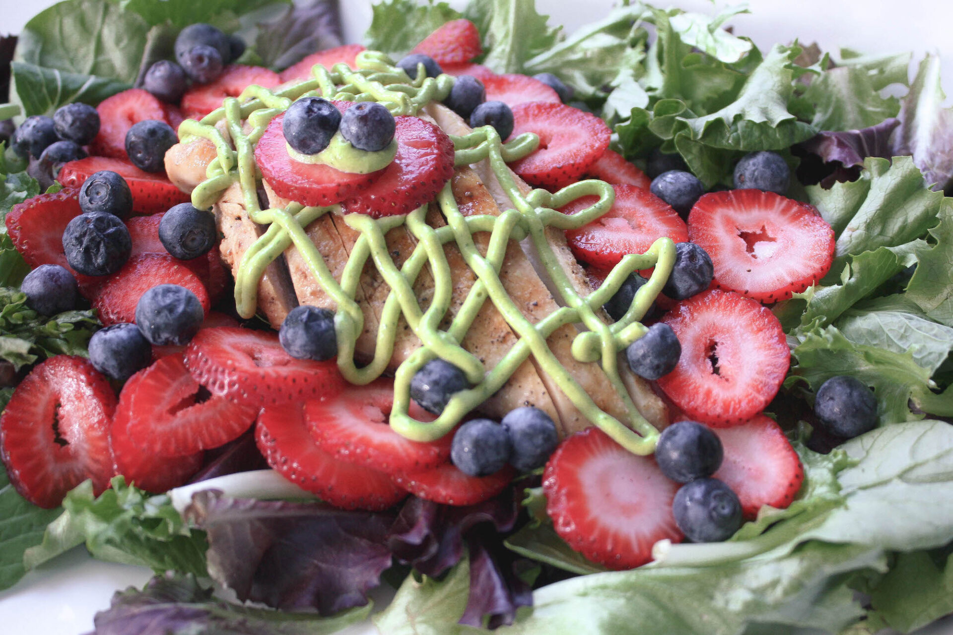 Summer Berry Salad with Grilled Chicken and Avocado Cilantro Lime Dressing | hearth health happiness