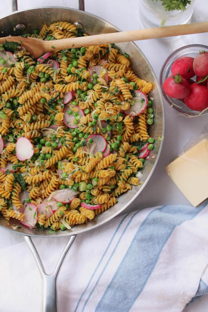 sauteed radish and green pea pasta in skillet