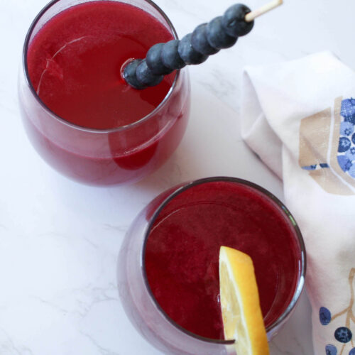 Two glasses filled with blueberry lemonade | summertime drinks | food blog | hearth health happiness