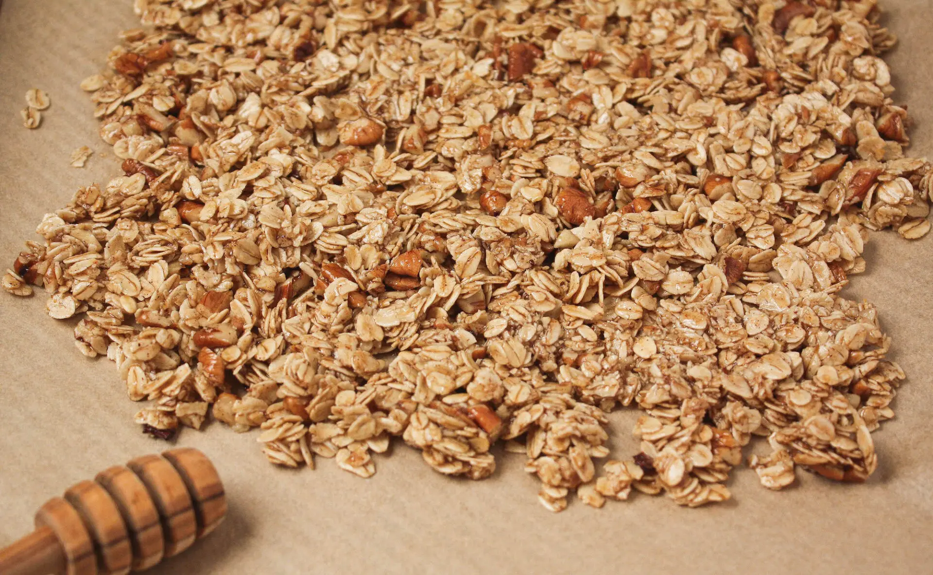raw granola before baking on parchment paper | homemade granola | food blog | hearth health happiness