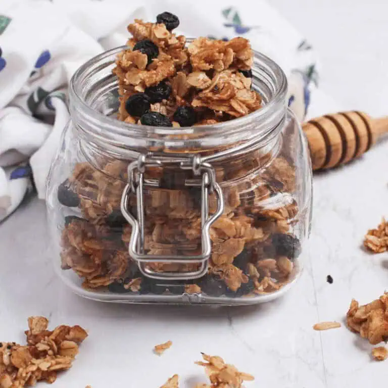 closeup of blueberry granola in glass jar