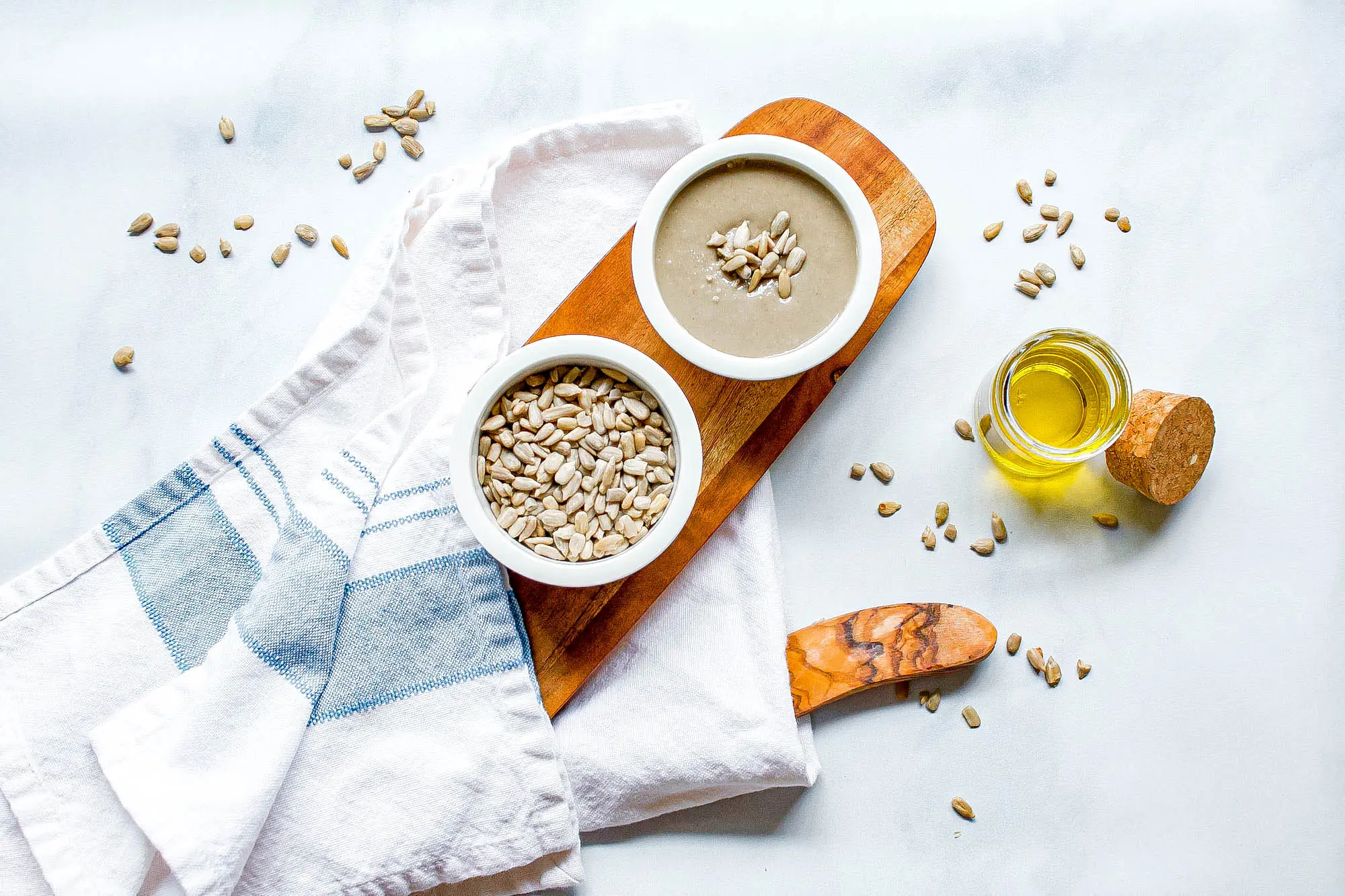 overhead image of sunflower seeds and sunflower seed tahini | food blog | hearth health happiness