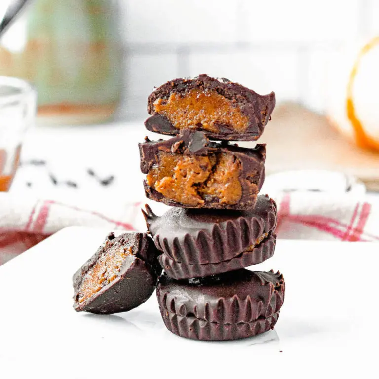 homemade pumpkin spice pecan butter cups stacked on plate