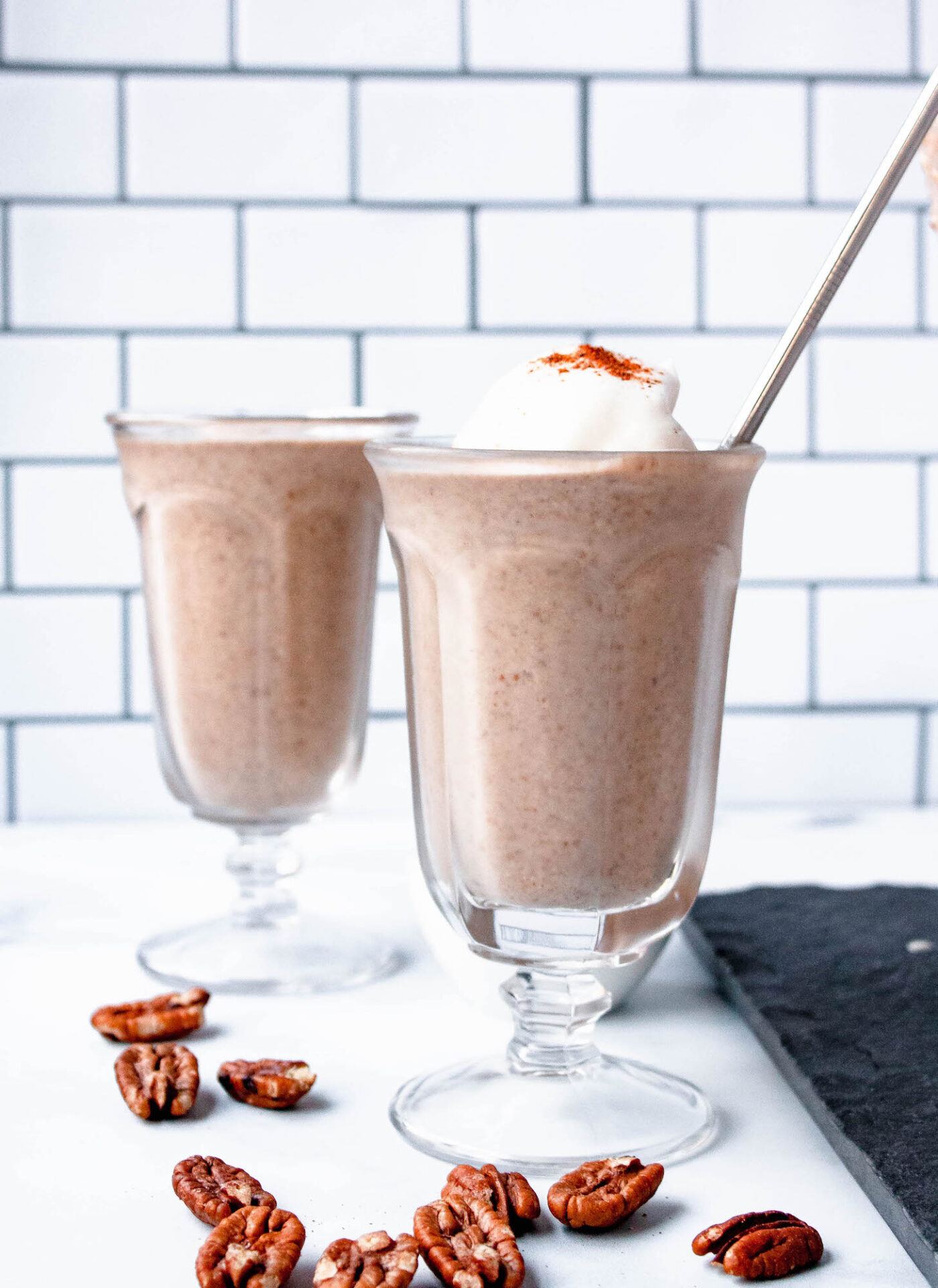 side shot of pecan pie smoothies with straw | comfort food | hearth health happiness