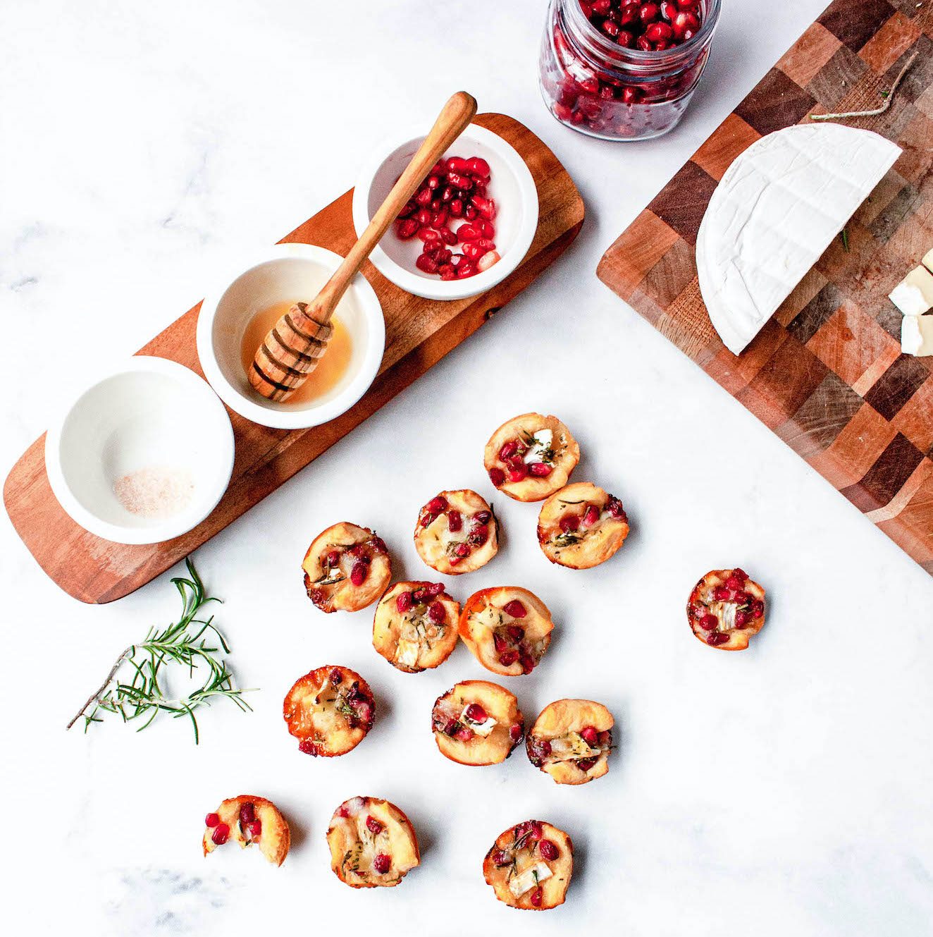 overhead image of pomegranate rosemary brie bites