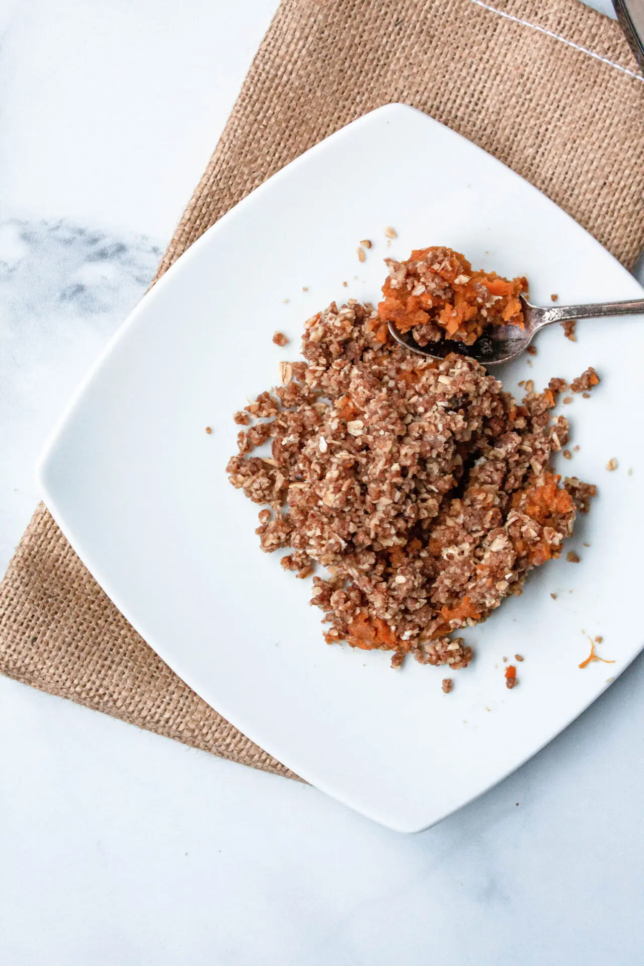 overhead image of slow cooker sweet potato casserole on plate