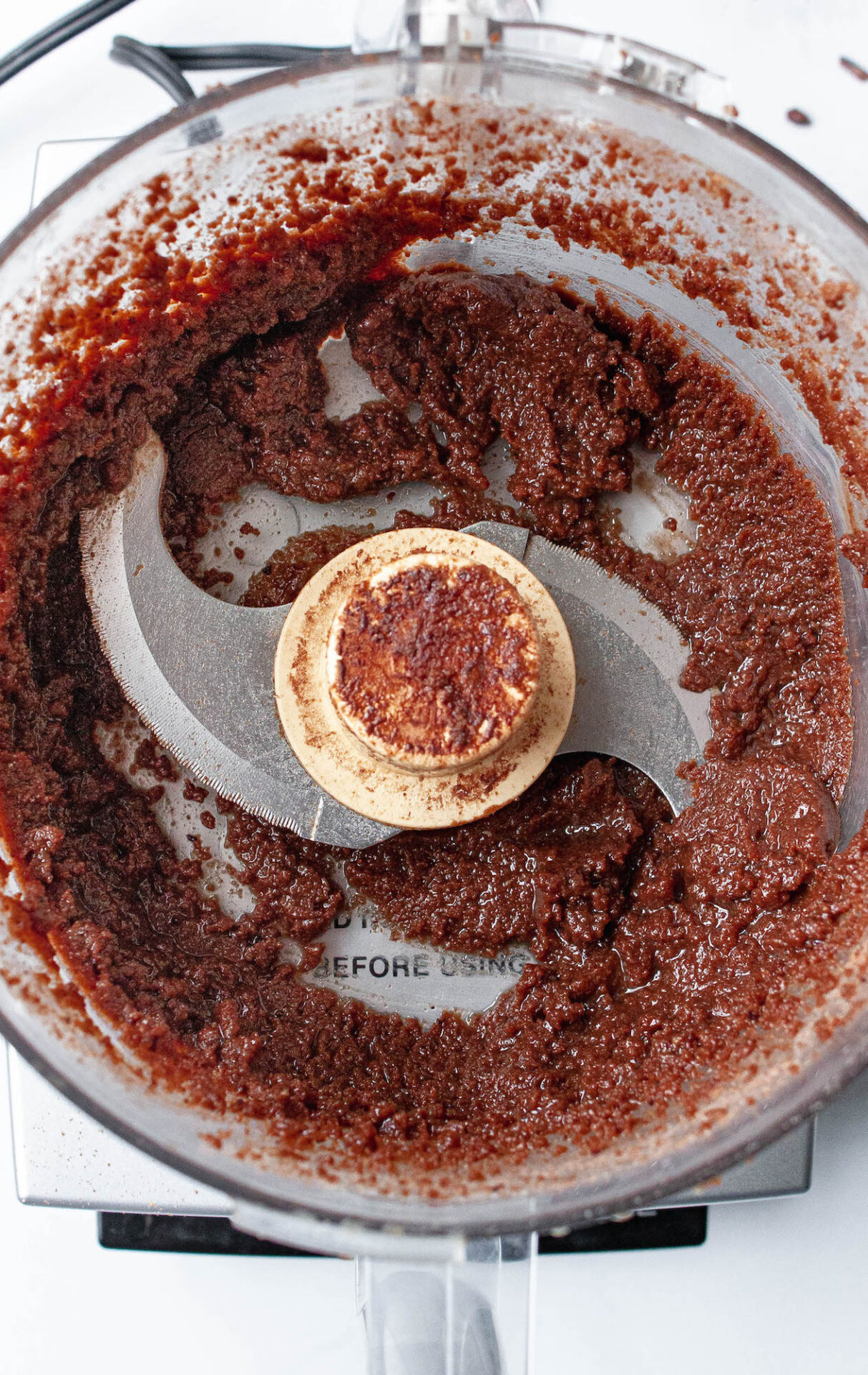 overhead image of chocolate pecan butter in food processor | flexatarian recipe
