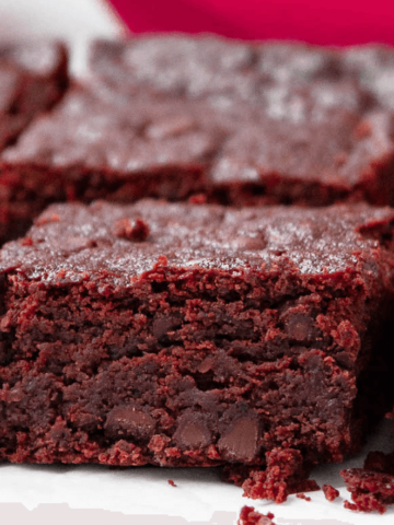 cut red wine brownies on parchment paper