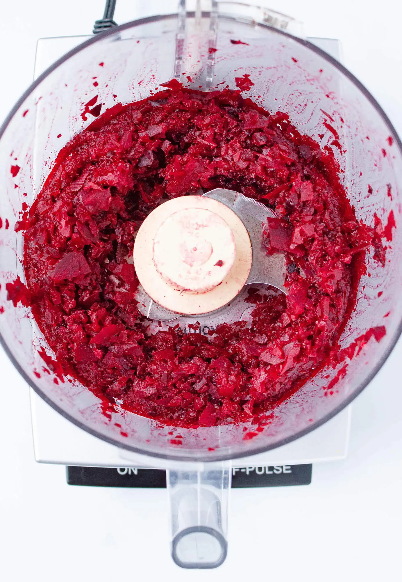 Food processor with roasted beet partially blended | hearth health happiness