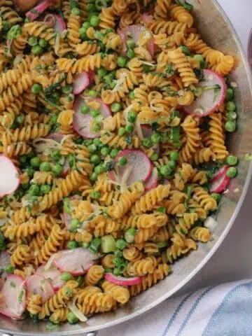 overhead image of sautéd radish pasta in skillet