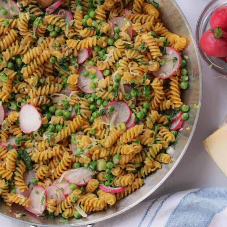 overhead image of sautéd radish pasta in skillet