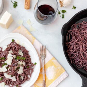 gluten free red wine pasta on counter with scattered ingredients