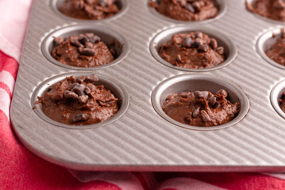 closeup image of chickpea brownie bites in cups