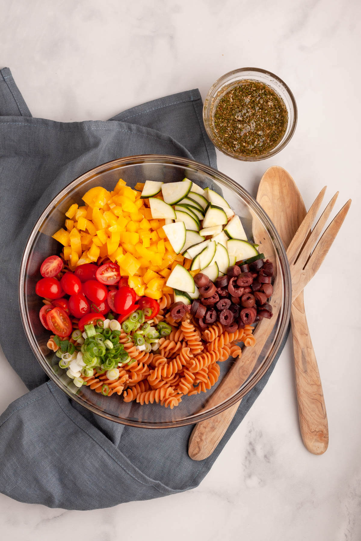 overhead image of separated red lentil pasta ingredients