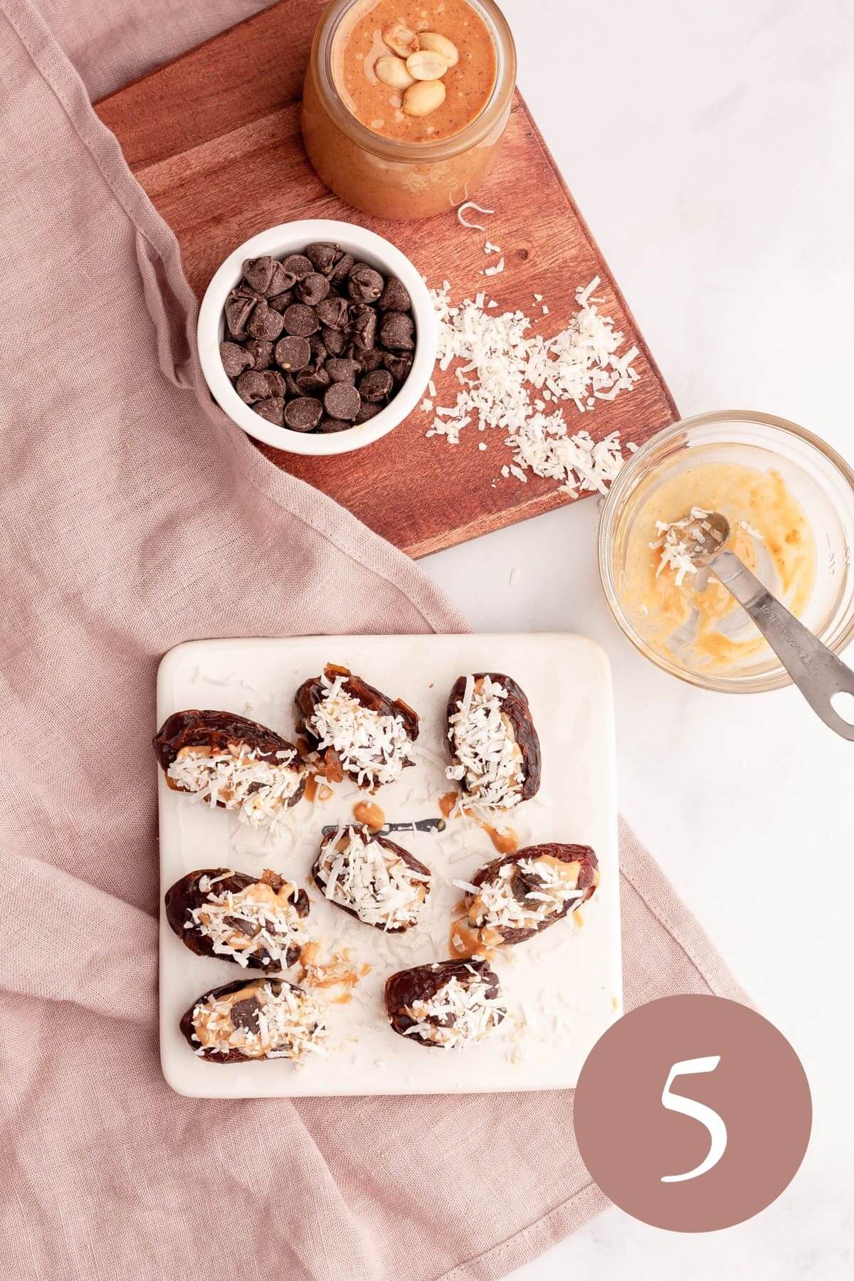 overhead image of peanut butter dates topped with shredded coconut