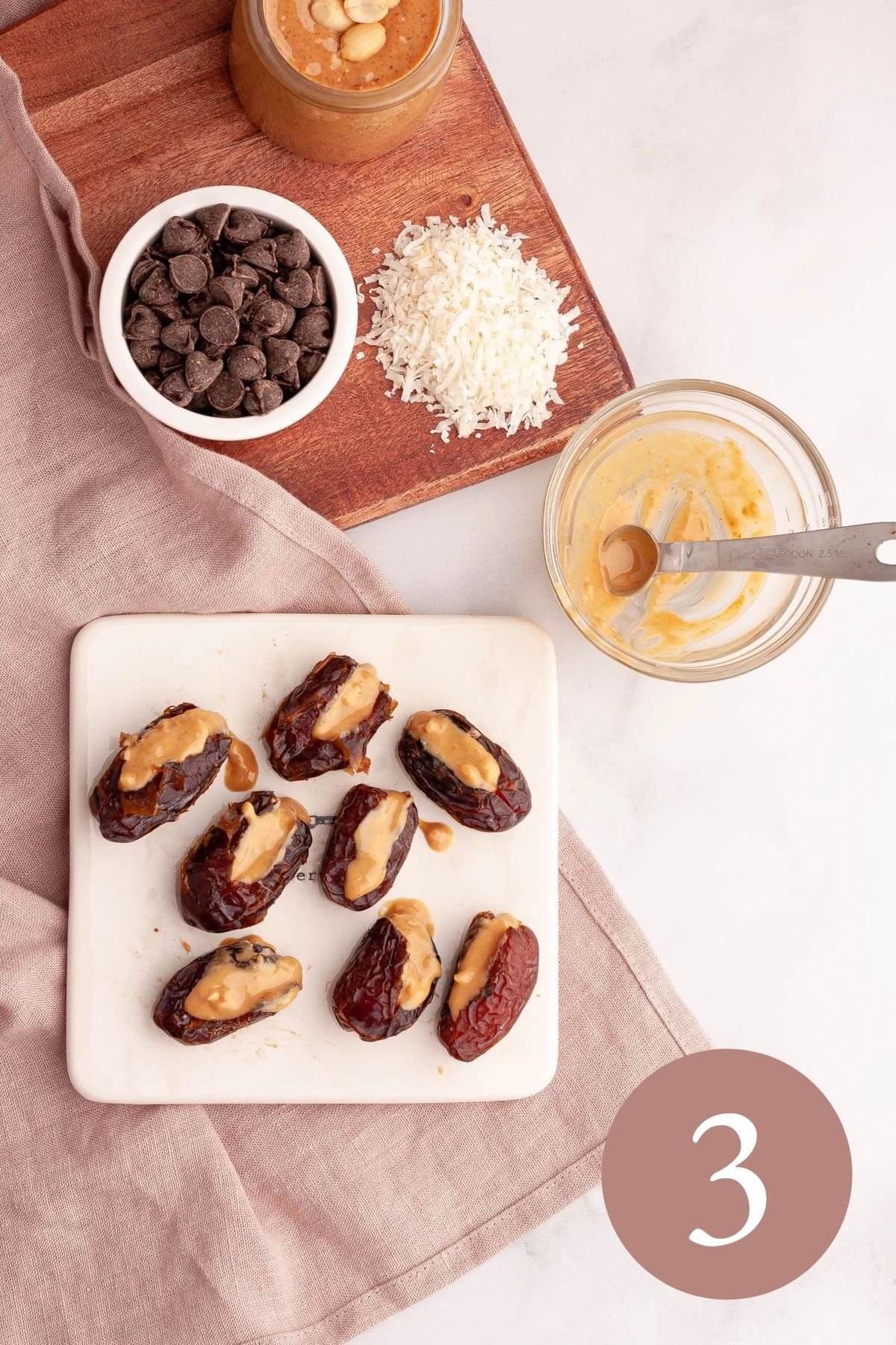 peanut butter dates on counter stuffed with peanut butter