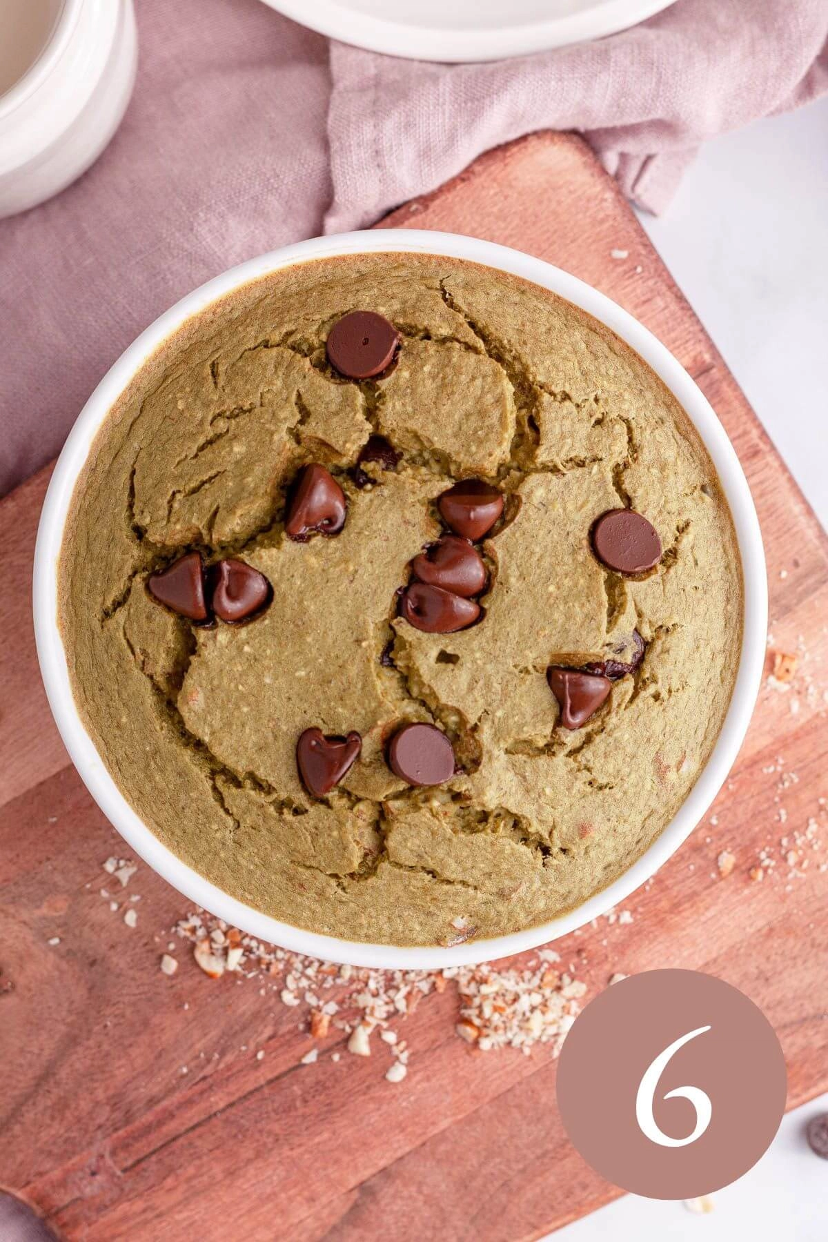 overhead image of matcha baked oats cooling on board