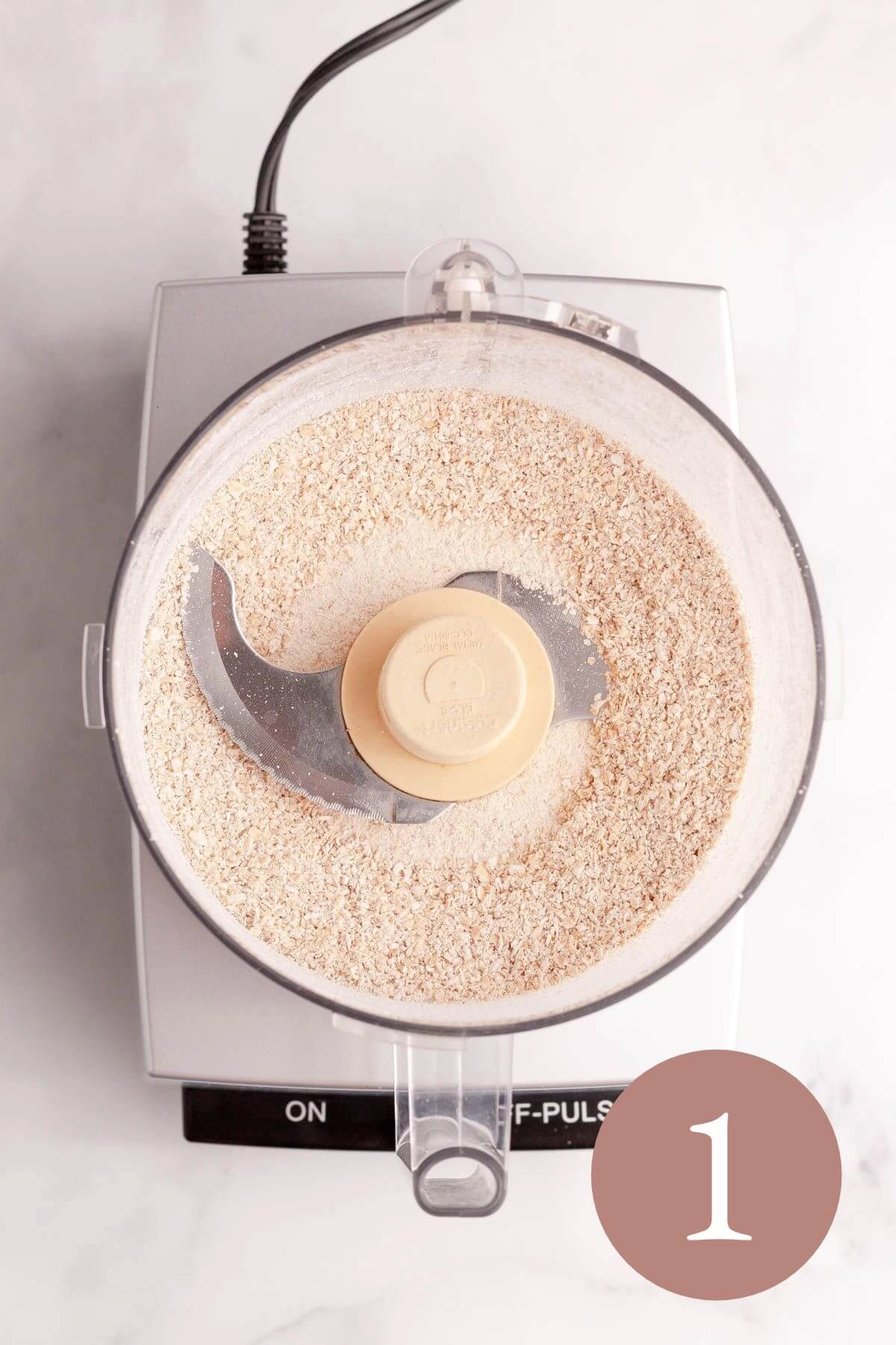 overhead image of oats blended in food processor
