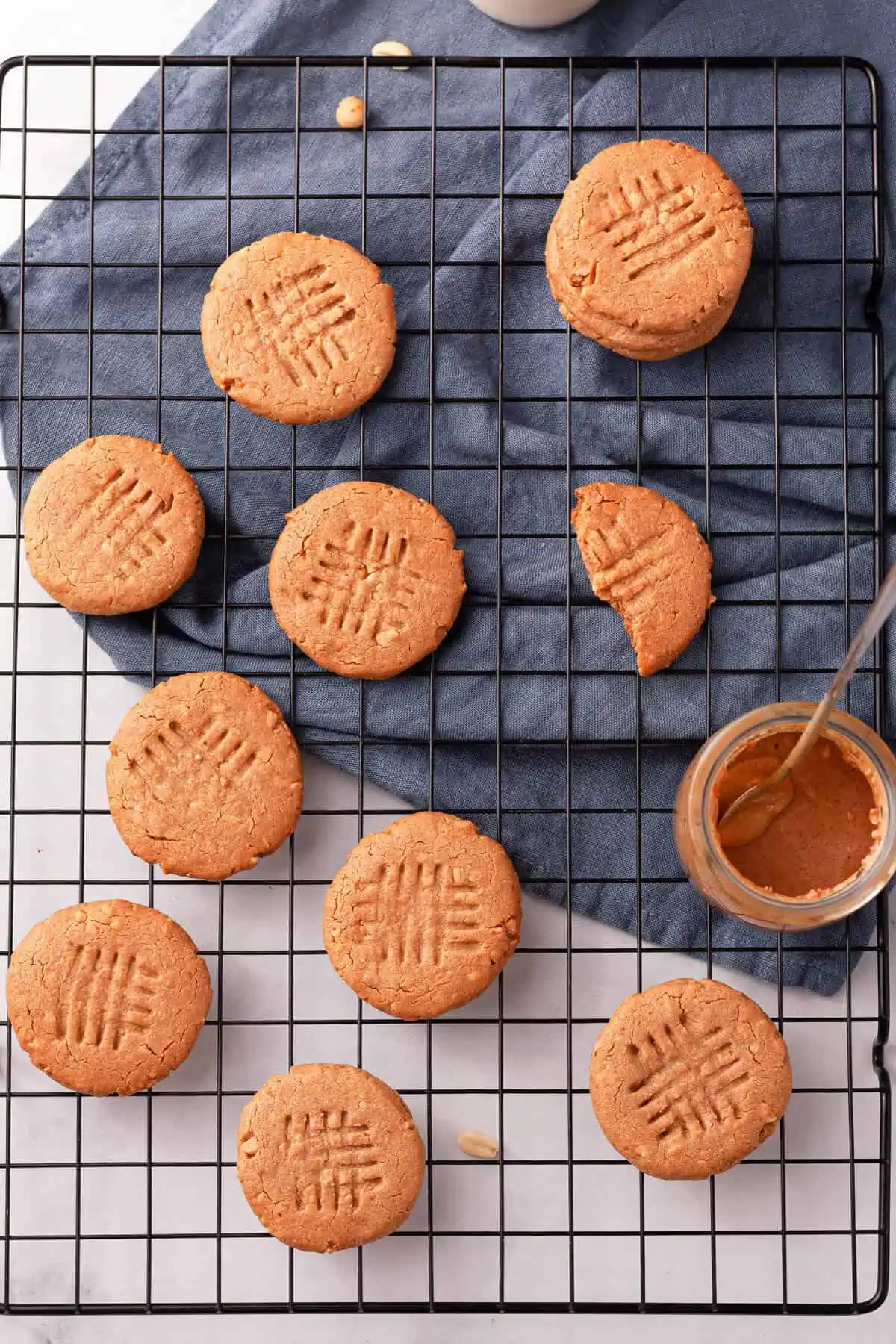 overhead image of 2-ingredient peanut butter cookies on wire cooling rack