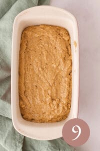Overhead image of bread dough in loaf pan before baking