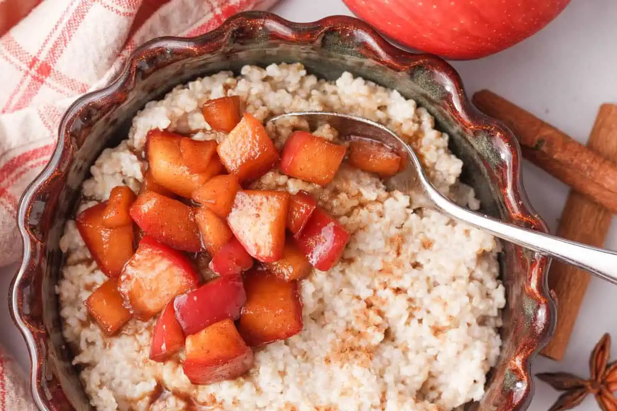 overhead image of caramelized apples on steel cut oats in bowl