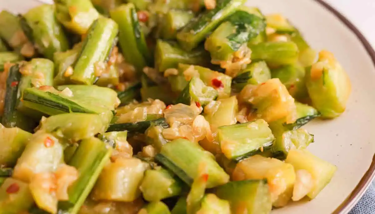 closeup of cooked collard green stems on plate