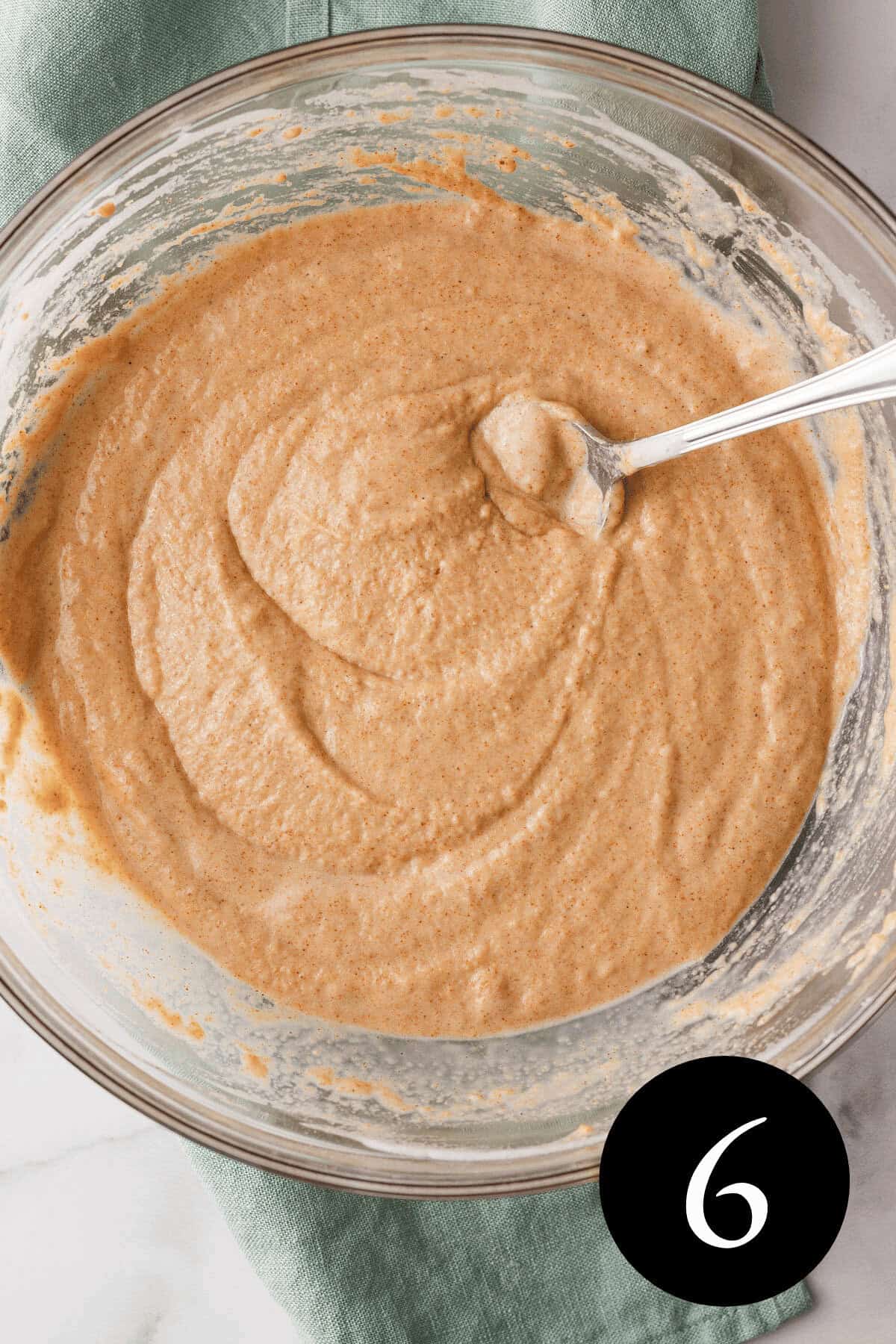 overhead image of pancake batter with number six in bottom right corner
