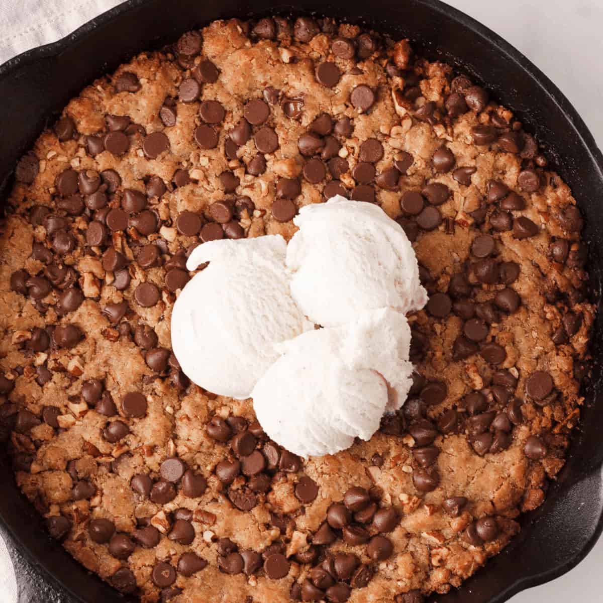 overhead closeup of vegan pizookie with ice cream on top