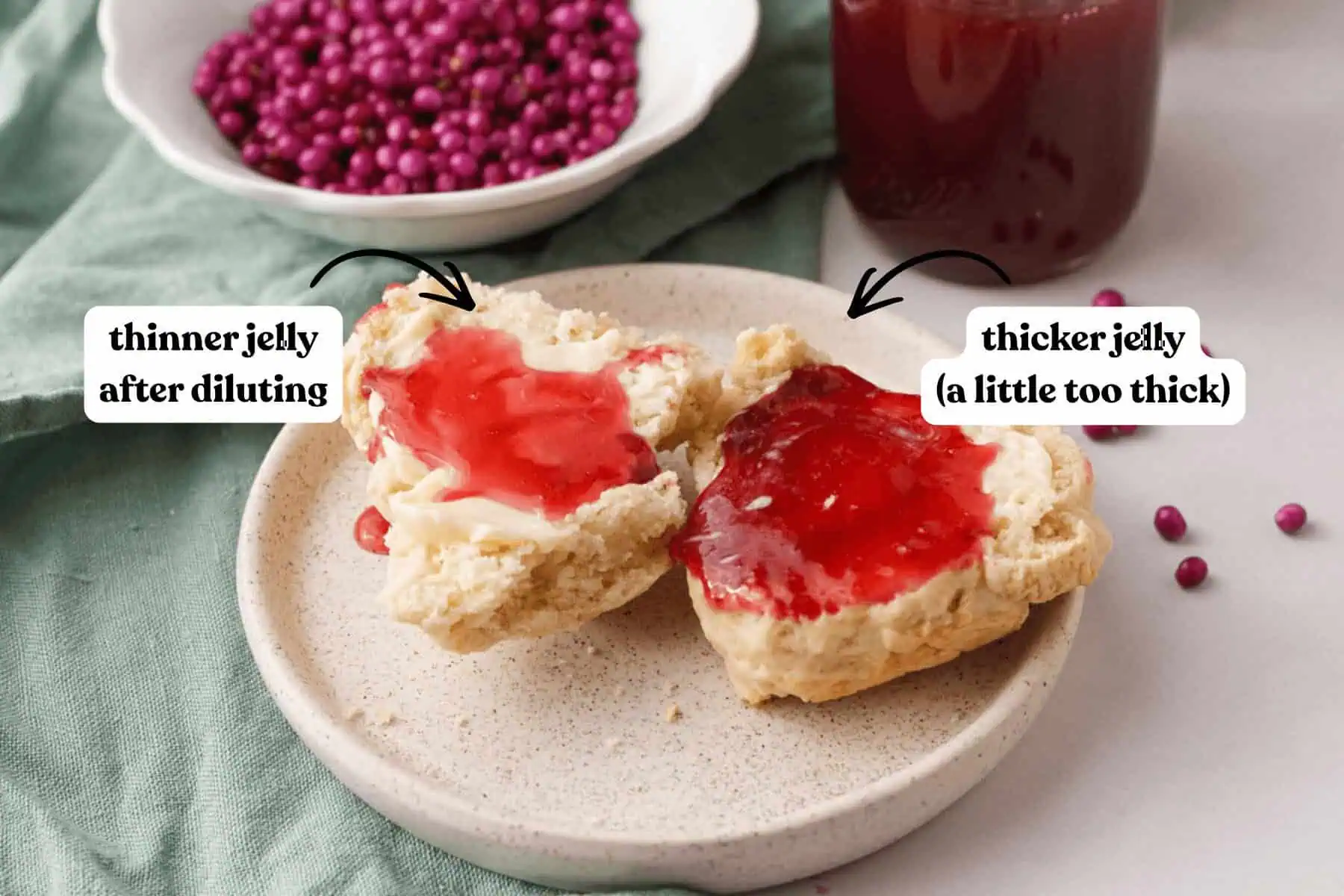 image of beautyberry jelly on biscuit comparing thick and thin textures with text labels