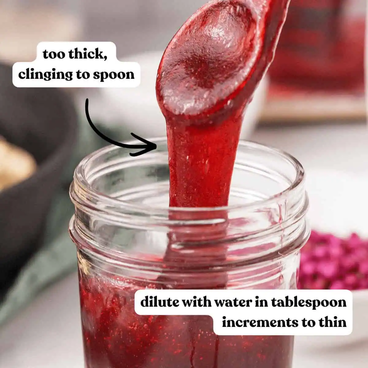 closeup of beautyberry jelly that's too thick clinging to spoon and text labels describing the texture and how to address