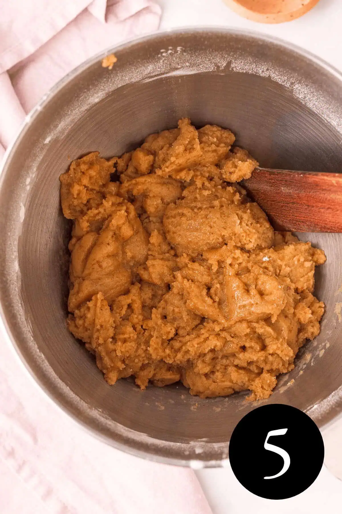 overhead image of cookie dough before adding pecans and chocolate chips with number five in the bottom right corner